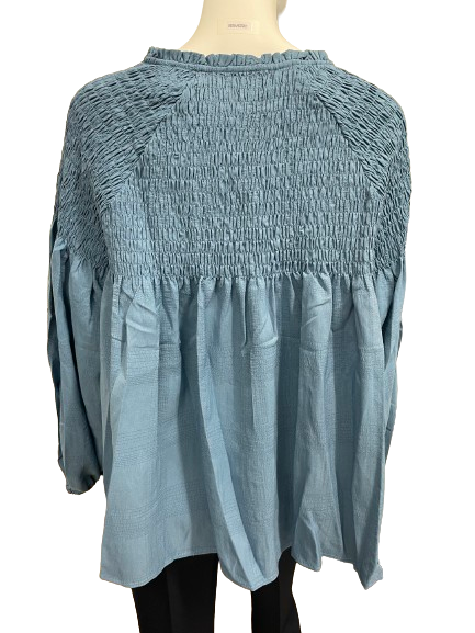 Blouse bleue smockée