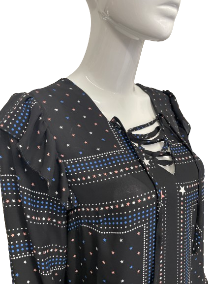 Blouse noire à imprimé étoiles