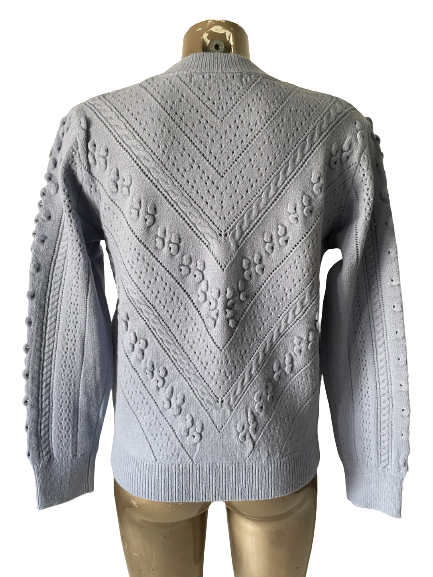 Pull bleu à motif chevron